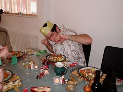 Paul hunkers down to our traditional Christmas lunch. Apparently not that traditional as we didn't include the brussel sprout and chestnut casserole. Gee, don't know why...