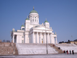 This is the Lutheran Cathedral on Senate Square, one of the iconic buildings of Helsinki, and visible from many places around town. The steps are left covered in snow to match it.