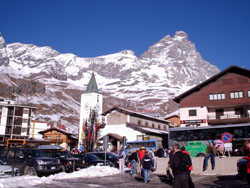 When we arrived at Cervinia by coach, this is the sight that greeted us: mountains, picturesque village, and blue sky!