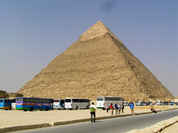 Surprisingly close to the centre of Cairo, in fact only 11kms from the centre of town, the three pyramids of Giza were as amazing in person as they look on TV. Here you can see the collection of tourist buses parked at the base of Khefre pyramid, the second largest of the three and the only one with any facing stones still intact.
