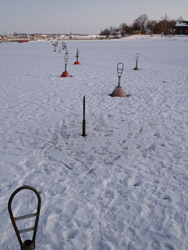 This is a marina in another part of the harbour. Well, it is when the Baltic Sea hasn't frozen solid. Note the many footprints between the buoys.