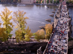 This is Charles Bridge, leading to the Castle, from one of its towers. The tourist movie shown in the tower is so dull that it's more interesting to listen to it in Czech.