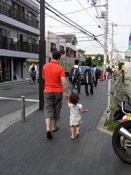 Doug and daughter on a Tokyo street.