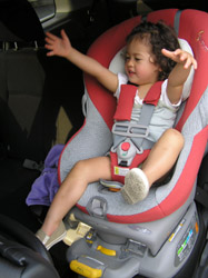 Hannah in her brand new car seat.